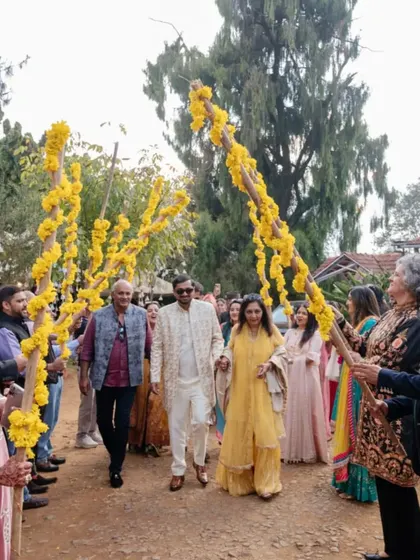 A candid shot of the groom's procession, filled with smiles and happy moments.