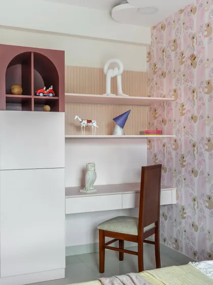 Another view of the study area, showing how the open shelves are perfect for displaying decor and keeping essentials within reach.