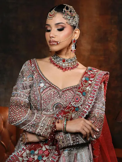 A beautiful shot showing the detail of the makeup with eyes down. The blending is seamless, and the look is pure perfection.