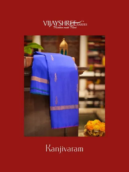 A royal blue Kanjivaram with trendy gold zari motifs, a perfect pick for the festive season.