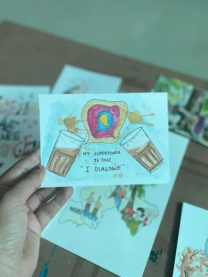 "My superpower is that I dialogue." This piece, featuring chai and bun maska, visualizes the magic of conversation, a core value of the organization it was made for.