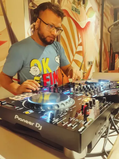 A close-up of me working the Pioneer DJ decks, showing the precision required for a flawless set.