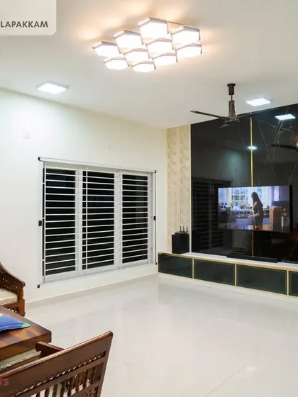 A duplicate image of the striking living room and TV unit in the Sithalapakkam villa.