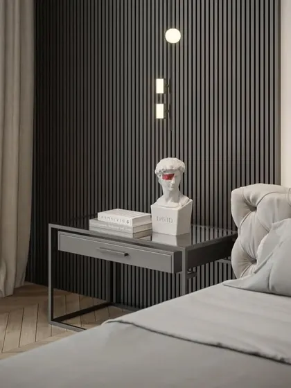 A close-up of the bedside table, showing how we use unique decor pieces to add personality and style to a room.