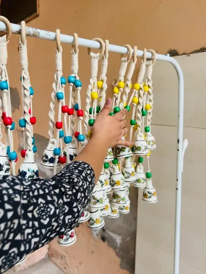 Our team preparing a batch of 'Symphony Chimes'. Available in four colors, these beautiful chimes have sold over 1100 units and are perfect for Diwali decor and gifts for your loved ones.