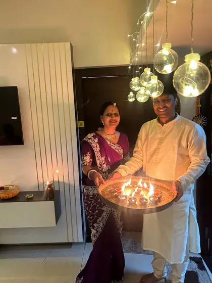 Ashutosh and Payal performing a Diwali puja. This beautiful image shows a couple sharing spiritual rituals, a core aspect of the connections we foster.