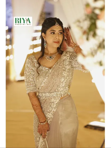 Another beautiful portrait of my client Greeshma in her custom sheer saree. The way the light catches the detailed handwork is just magical. I always consider how the outfit will look in photographs and at events to ensure my clients feel their absolute best.