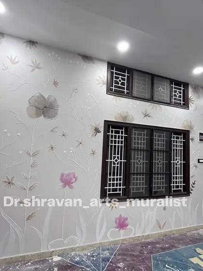 This floral texture art was created using Plaster of Paris and putty. The subtle relief of the flowers and stems across the entire wall, with hints of color, creates a delicate and immersive environment.