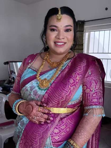 A radiant look for Preethi's baby shower. This shows how traditional makeup techniques can be adapted for different special occasions, focusing on a happy, glowing finish.