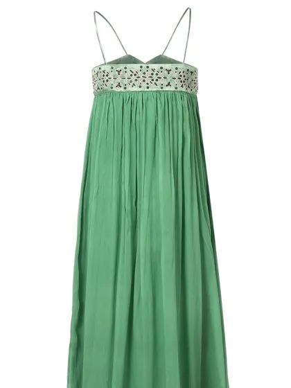 The back view of the green maxi dress, detailing the strap design and the gathering at the waist. Providing multiple angles is key for e-commerce success.