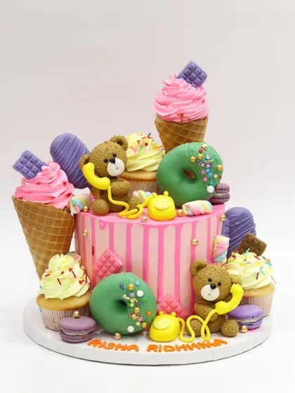 The full candyland cake, a dream come true for any child with a sweet tooth.