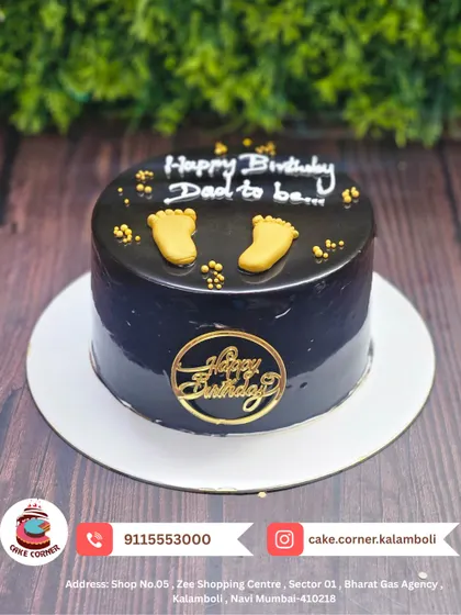 A sweet chocolate cake for a "Dad to be". The tiny golden feet are an adorable way to celebrate the exciting journey into fatherhood.