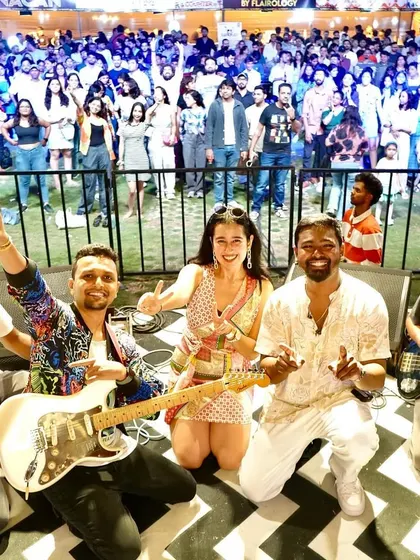 This is us, The Sarah Collective, with our amazing audience at The Wassup Flea. Seeing a sea of happy faces is the ultimate reward for any musician.
