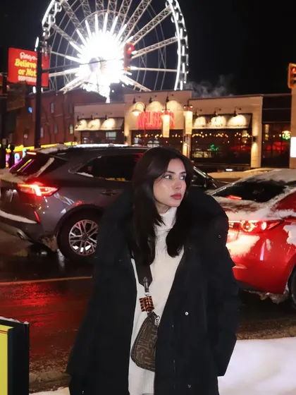 Enjoying the lively atmosphere of Clifton Hill on a cold winter's night.