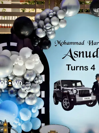 A close-up of the backdrop for the Thar themed party.