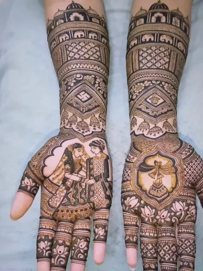 A classic design showing the varmala ceremony. The bride and groom portraits are the centerpiece, surrounded by auspicious symbols like the swastika and kalash.