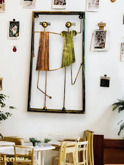 Our metal figure wall decor is a unique piece that adds a human touch to your art collection.