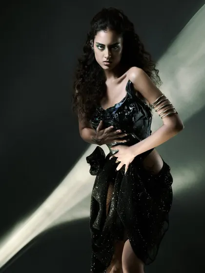 Another pose from the projector series, with the light cutting across the model's body.