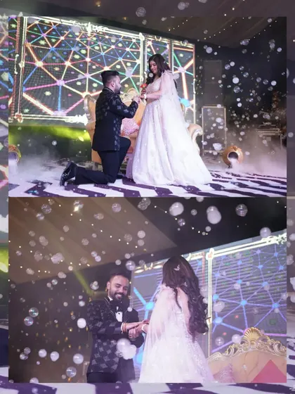 The magical moment of the proposal, complete with a bubble machine and stage lighting, creating a dreamy and unforgettable scene.