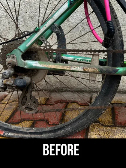 A detailed 'before' shot of the Trek's rusty chain and derailleur. This is a common issue we fix, extending the life of the components.