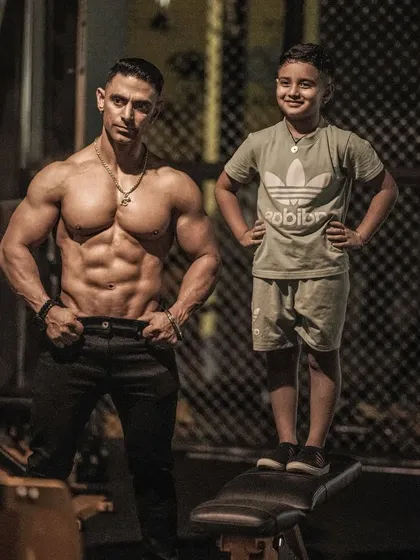 I don't want my son to have my abs; I want him to have my discipline. Building a legacy of good habits is more important than genetics.