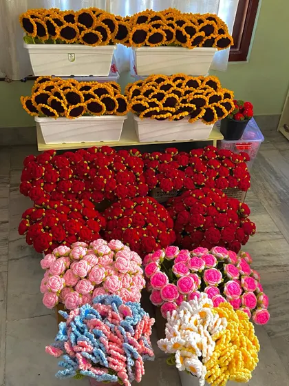My favorite corner filled with finished flower heads in various colors and styles, from sunflowers to pink roses.