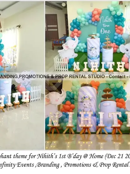 One of our most popular designs, this baby elephant theme is perfect for a first birthday at home. The setup features a soft blue backdrop with a pastel balloon garland, elephant cutouts, and themed cylinder props.