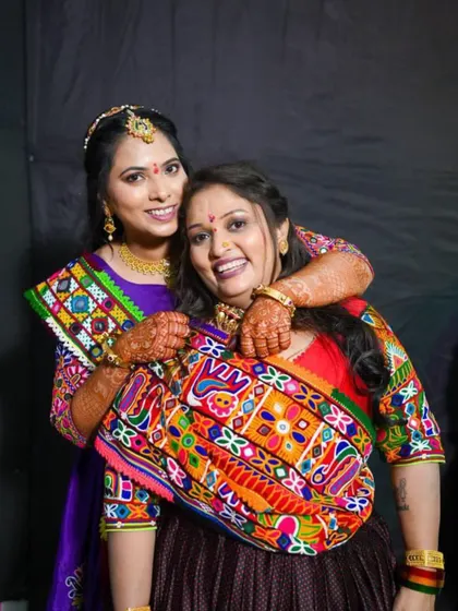 A happy moment between sisters or friends at a wedding event. I provide party makeup for family members too.