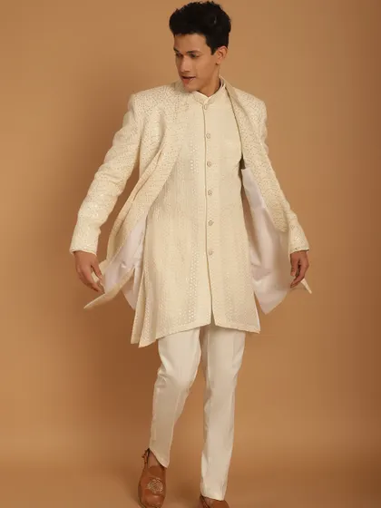 The flow and movement of this ivory Indo-Western jacket show how my outfits are designed for comfort, allowing you to celebrate without feeling restricted.