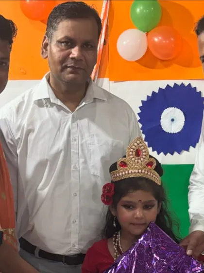 A young performer dressed as Bharat Mata receives a prize during our Independence Day event. We encourage and celebrate talent in all its forms.