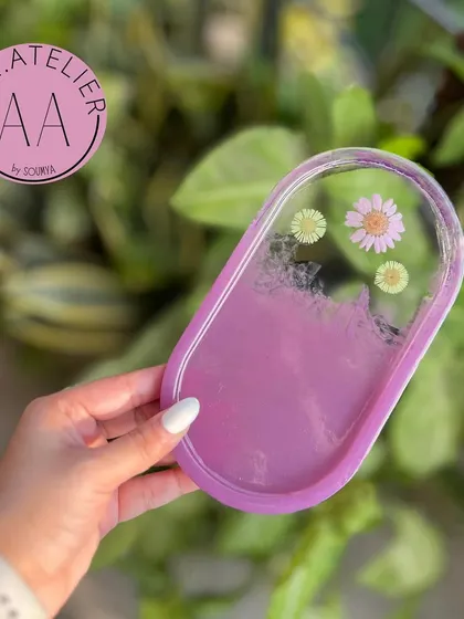 A lovely lilac oval trinket tray. The soft color and preserved flowers make it a perfect accessory for a vanity or dressing table.