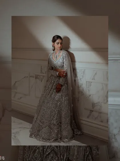An artistic portrait of the bride, with dramatic shadows creating a moody and beautiful effect.