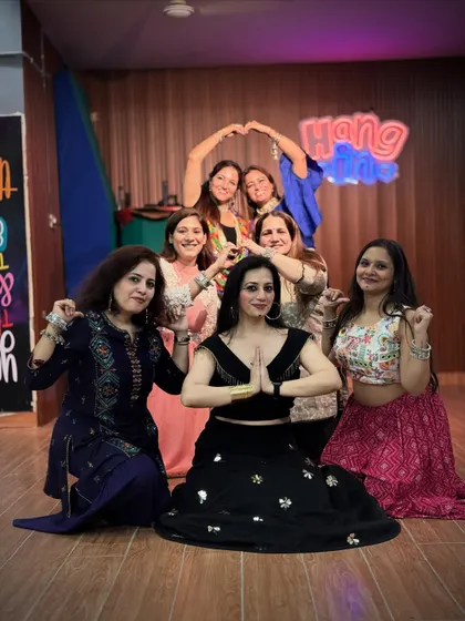 More than just a class, we are a community. A moment of togetherness and shared joy after a fantastic Garba dance session.