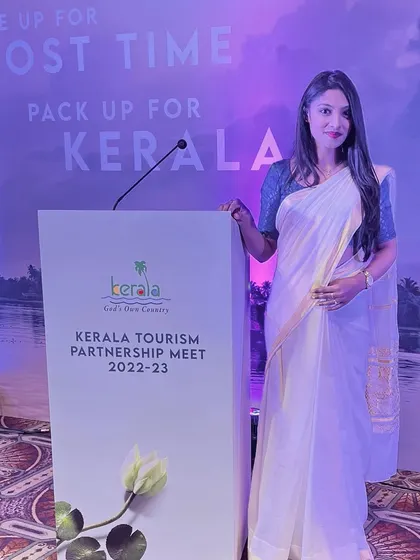 Another angle from the Kerala Tourism Partnership Meet, showcasing the stage and branding.