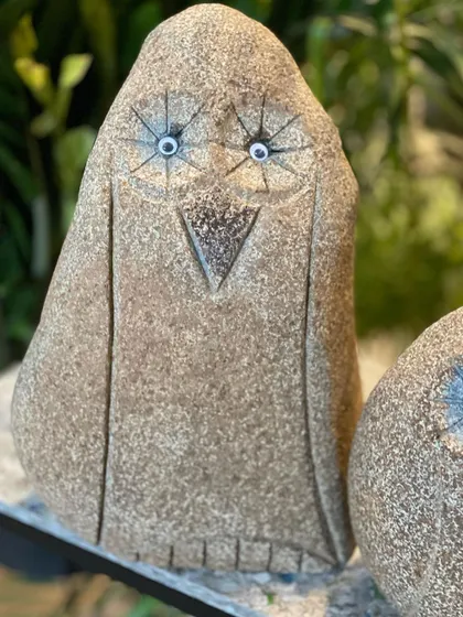 This is 'Goobey', our eccentric owl carved from natural rock. This quirky piece is sure to make you smile and is perfect for a bookshelf, a garden nook, or even as a unique door stopper.