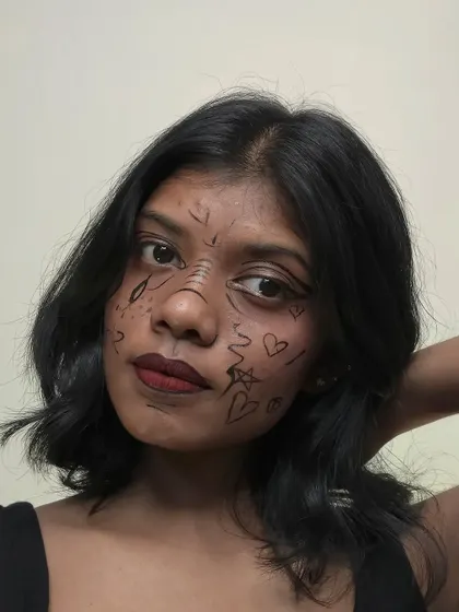Sometimes I just like to scribble. This "human doodle" look was a therapeutic and fun way to play with lines and shapes directly on the face.