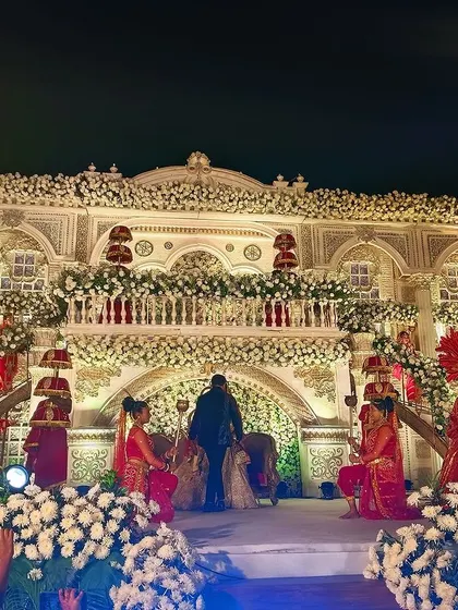 A royal entry at its grandest. This performance at the Bangalore Palace grounds shows the scale and opulence we can bring to your big day with our costumed dancers.