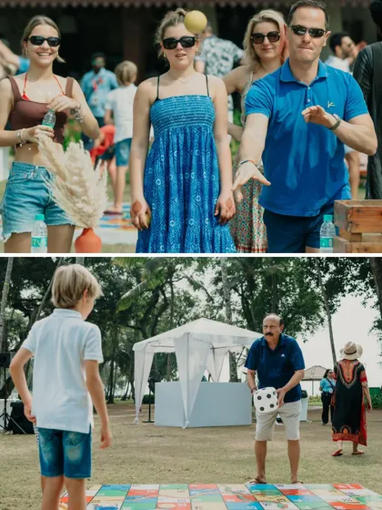 Guests enjoying giant Jenga and other lawn games during the picnic day. It's all about creating relaxed and fun experiences.