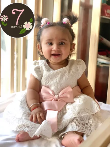 My cutie at 7 months old. Celebrating her monthly milestones with a little photoshoot.