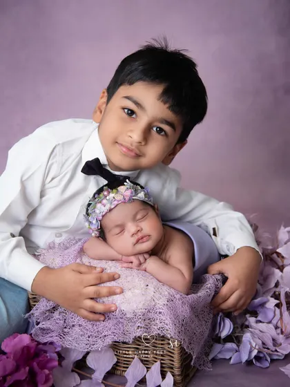 Big brother duties have officially begun! He is so gentle and proud, holding his new baby sister. These are the moments that make my job so rewarding.