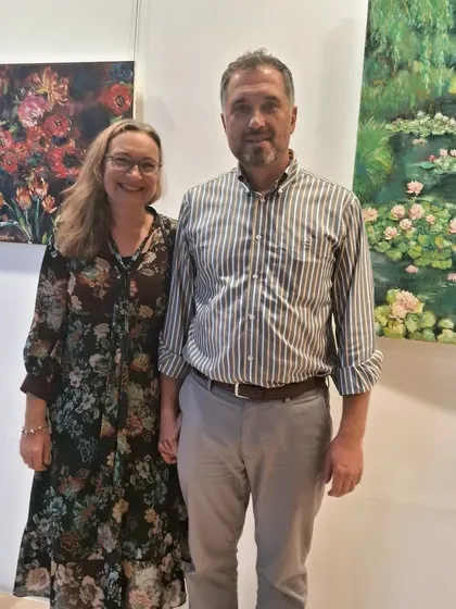 Artist Aleksandr Ibragimov and his wife at his solo exhibition at Sublime Galleria.