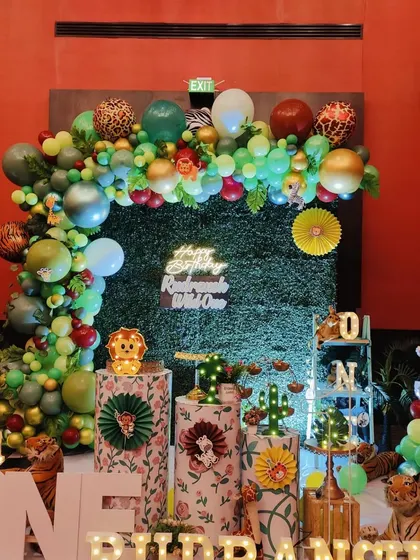 A detailed shot of the themed pedestals and props for the safari party, showing how every element contributes to the overall theme.