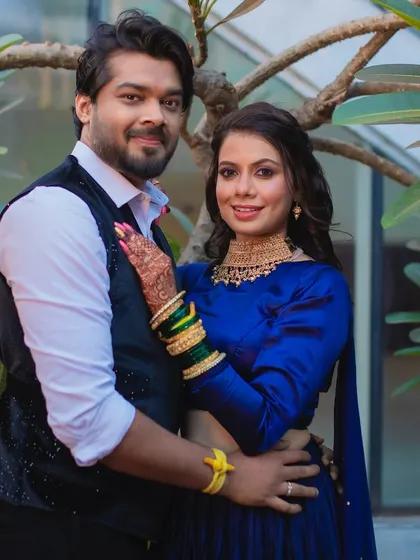 A glamorous Sangeet look with a blue smokey eye to match her stunning lehenga. A bold and beautiful choice for a night of dancing.
