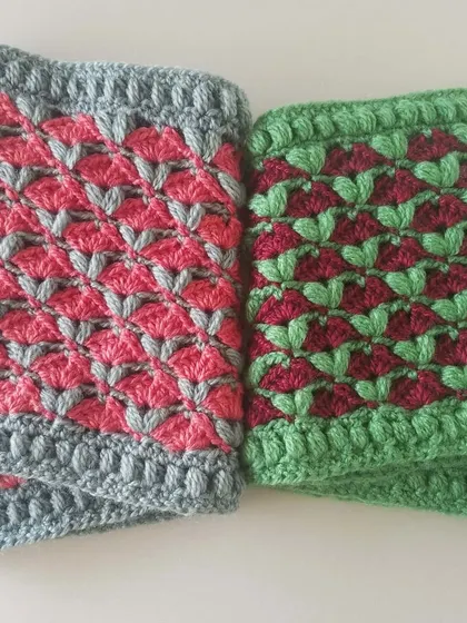 My two Cardamom Blossoms cowls side-by-side. It's amazing how different color choices can change the entire look of the same crochet pattern.