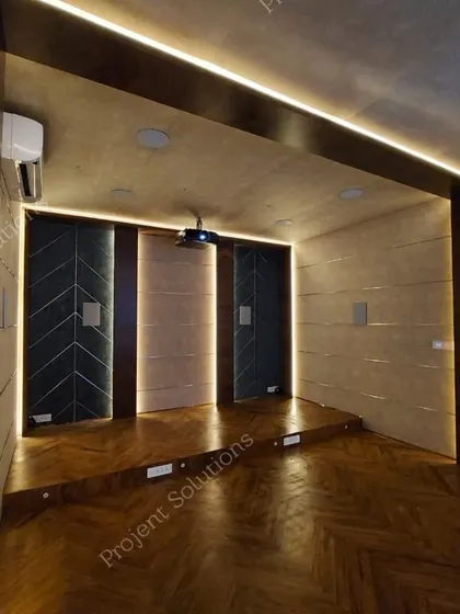 Here, linear LED lighting is integrated directly into the room's architecture, tracing the ceiling and doorways. This technique defines the space and guides the eye, creating a polished and cohesive design.