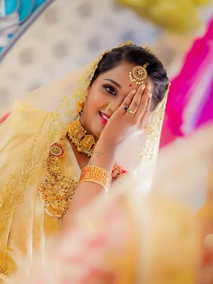 A playful and happy moment with the bride. Confidence is the best makeup, and I love helping my clients find it on their special day.