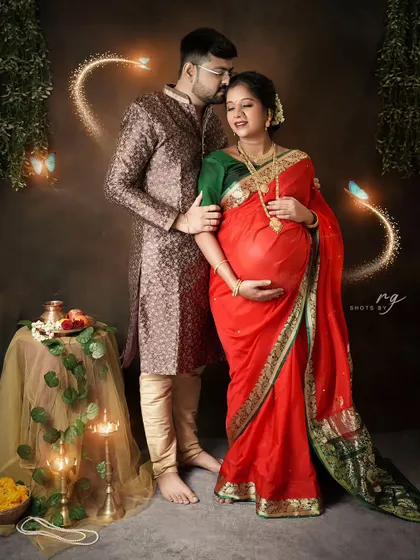 A tender moment captured with a touch of magic. We added subtle light effects to enhance the romance of this traditional Maharashtrian maternity portrait.