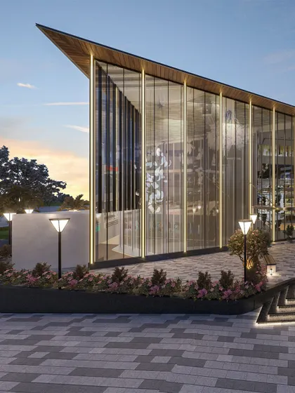 Our work extends to commercial spaces designed to be urban destinations. For this mall, we designed a dramatic, angular glass entrance to create a modern and inviting landmark that draws people in.