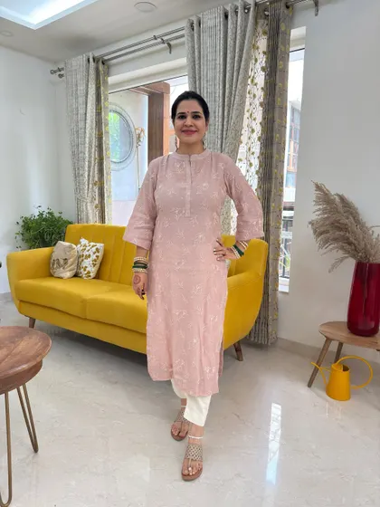 A full-length view of my Hariyali Teej outfit. The straight-fit pink kurta is so comfortable and easy to wear, which is perfect for a day full of festivities. It proves that you can look festive without compromising on comfort.
