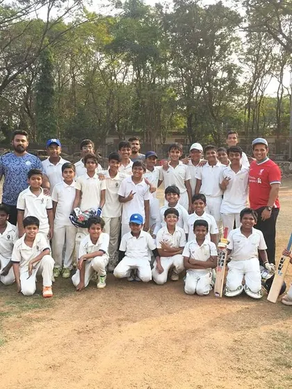 Sportsmanship is a core value we teach. Here, our team poses with the opposition, Unique Cricket Academy, after a competitive and hard-fought match, showing respect for the game and opponents.